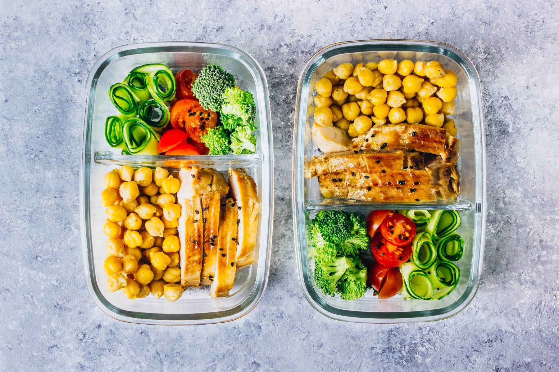 Two prepared meal containers, portioned and ready